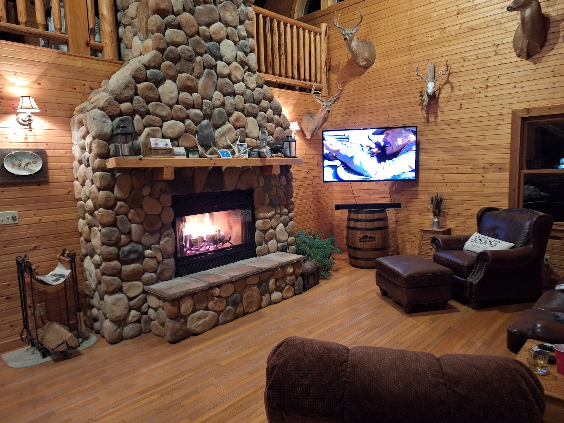 146 Sparkman Town Road Rock Island, TN 38581 - Photo 39 of 60 a living room with furniture a flat screen tv and a fireplace
