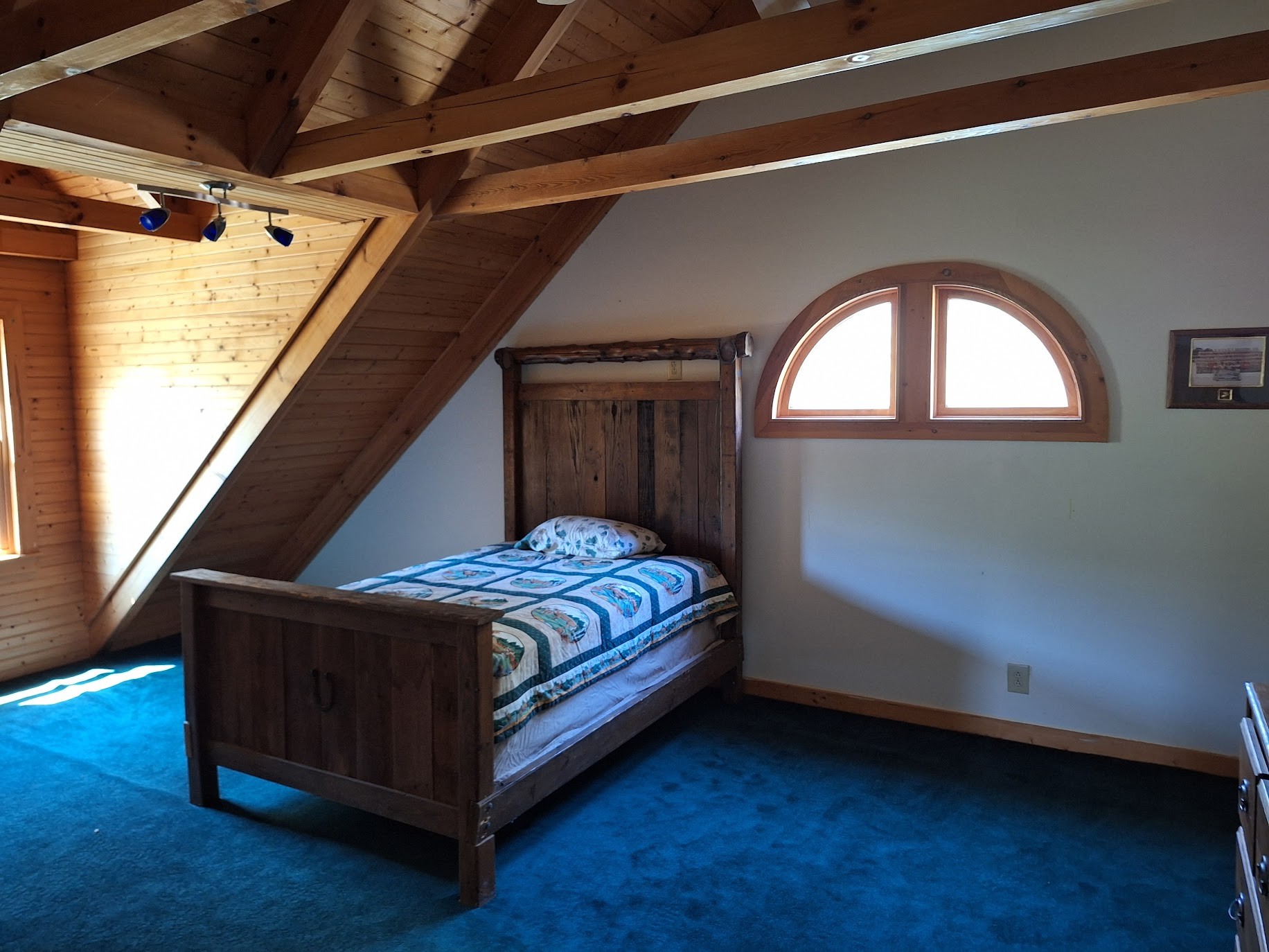 146 Sparkman Town Road Rock Island, TN 38581 - Photo 48 of 60 a bed sitting in a bedroom next to a window