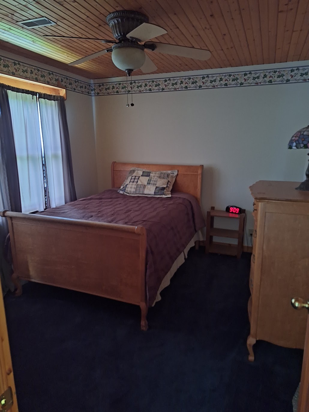 146 Sparkman Town Road Rock Island, TN 38581 - Photo 54 of 60 a bedroom with a bed and a mirror