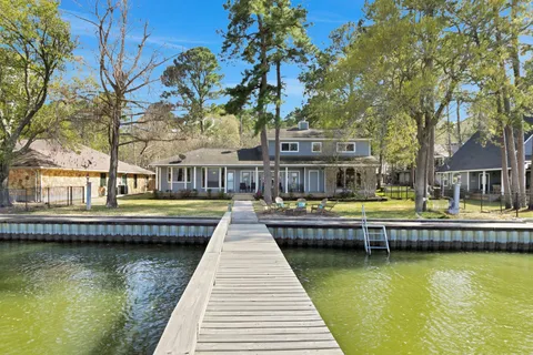 a view of swimming pool with outdoor seating