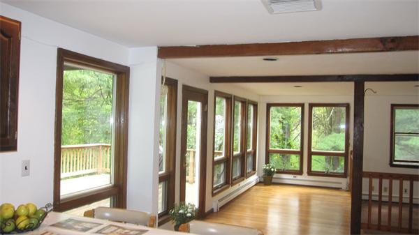 65 Williams Road Concord, MA 01742 - Photo 4 of 15 a view of a room that has a bed and a window