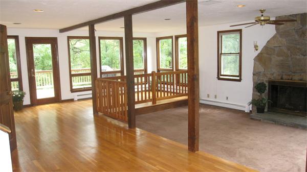 65 Williams Road Concord, MA 01742 - Photo 6 of 15 a view of an entryway with wooden floor and door
