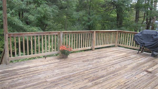 65 Williams Road Concord, MA 01742 - Photo 9 of 15 a view of a wooden deck