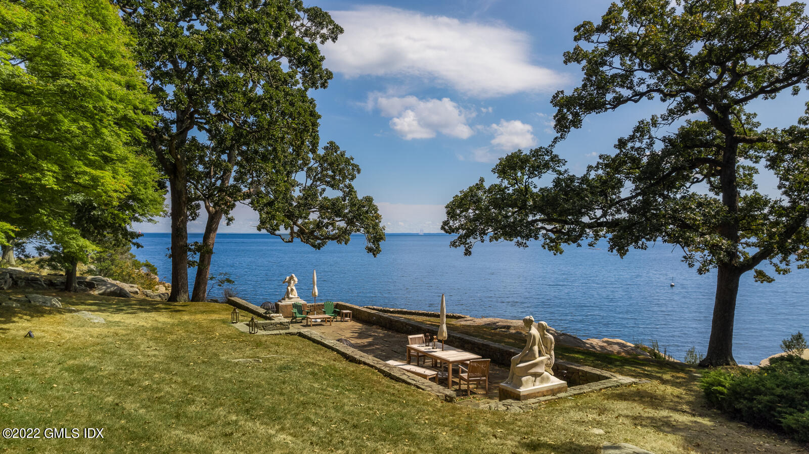 Great Island Darien, CT 06820 - Photo 13 of 16 a backyard of a house with lots of green space