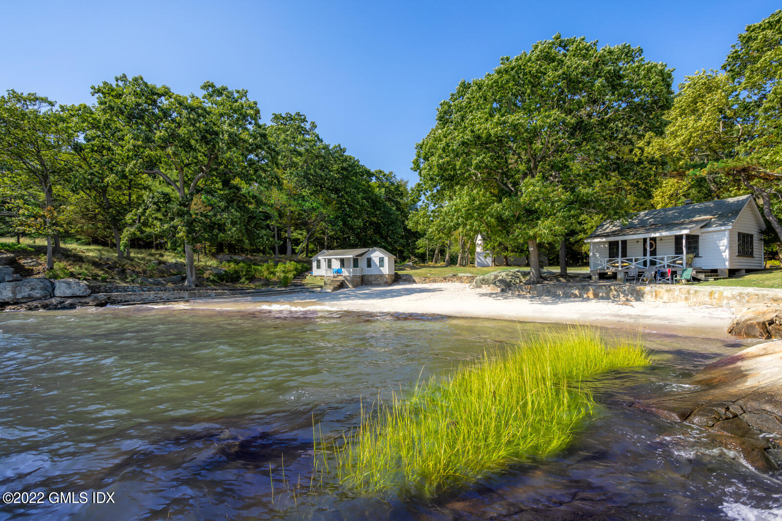 Great Island Darien, CT 06820 - Photo 15 of 16 a view of a swimming pool with chairs