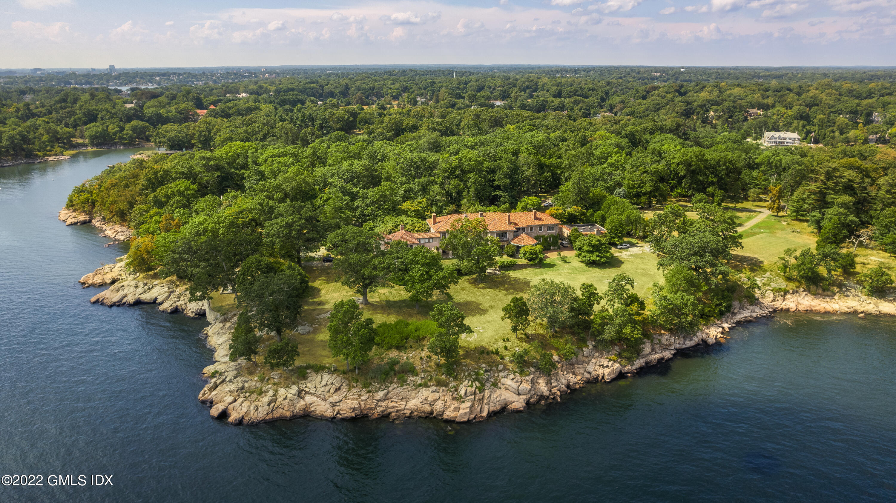 Great Island Darien, CT 06820 - Photo 2 of 16 a view of a lake with a yard