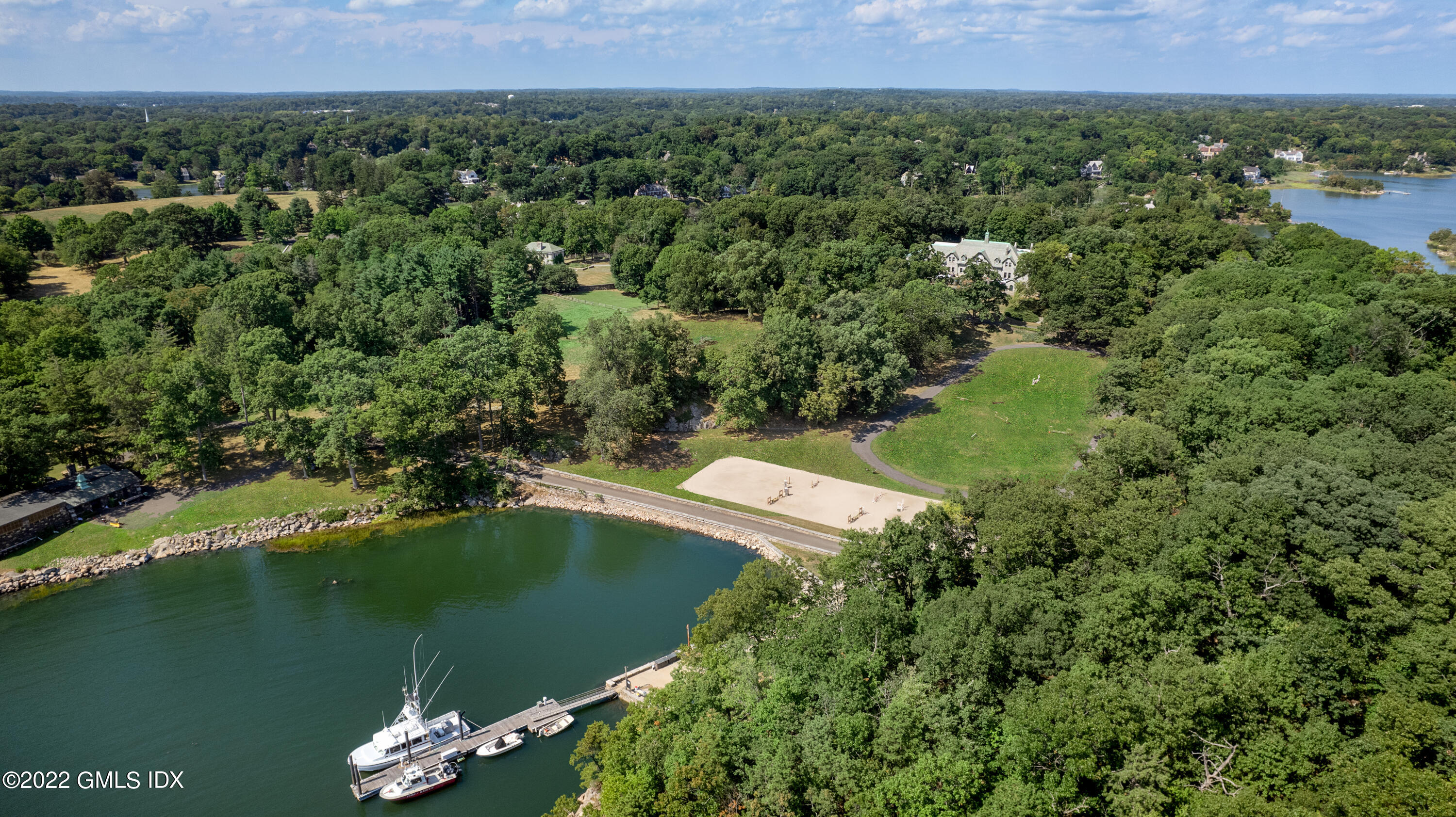 Great Island Darien, CT 06820 - Photo 4 of 16 an aerial view of a house with a yard