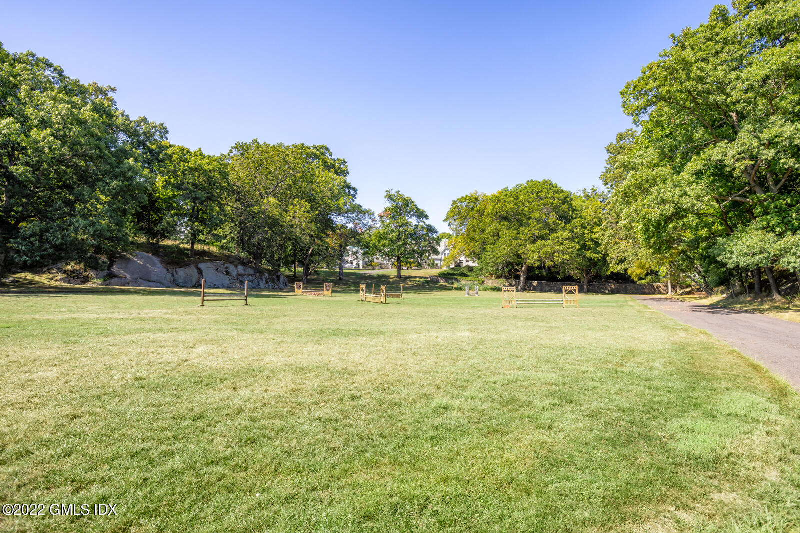 Great Island Darien, CT 06820 - Photo 6 of 16 a view of a swimming pool and trees in the background