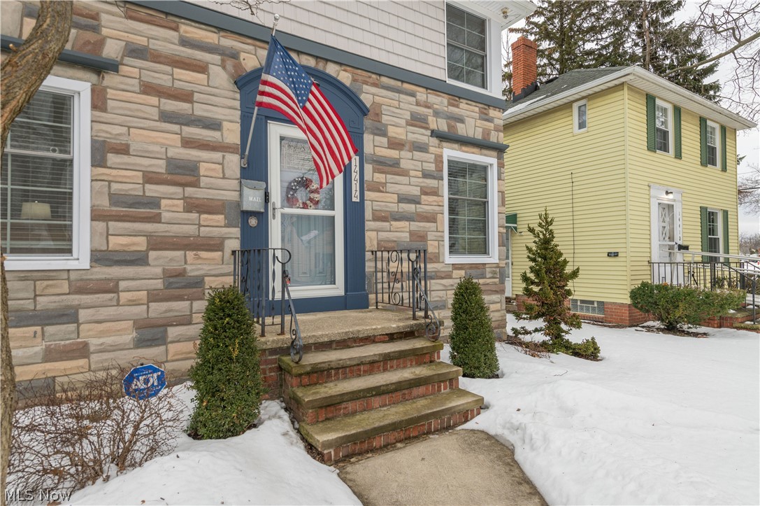14414 Alger Road Cleveland, OH 44111 - Photo 2 of 33 Welcome home — a charming entry that sets the tone for the warmth and character throughout.