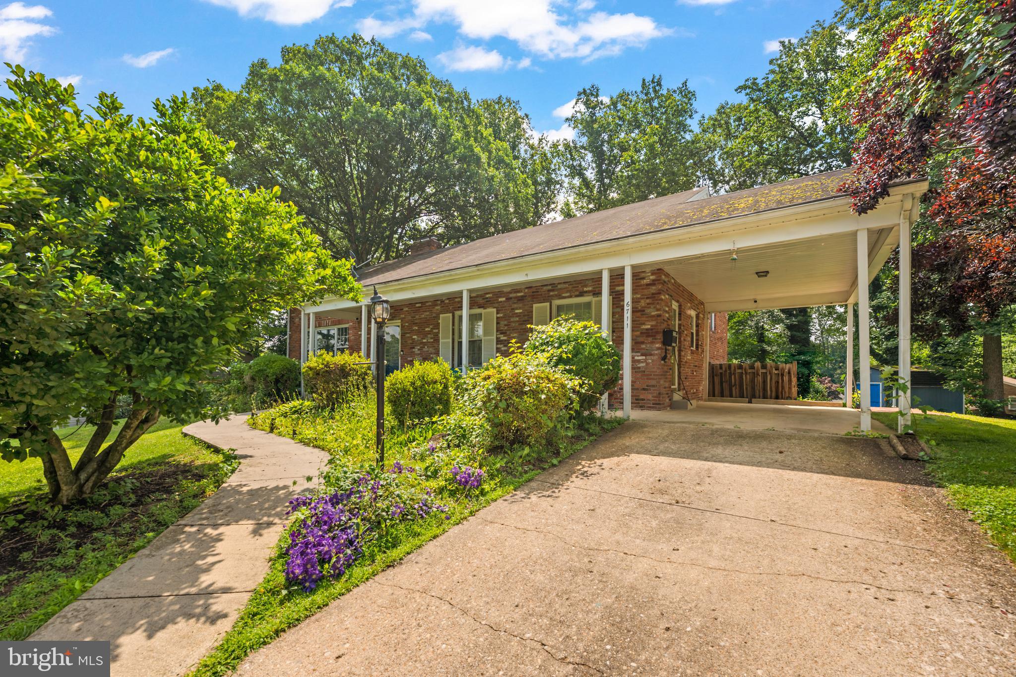 6711 Doane Avenue Springfield, VA 22152 - Photo 2 of 13 Carport & Driveway