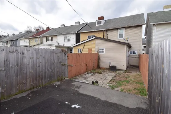 a view of a small white house