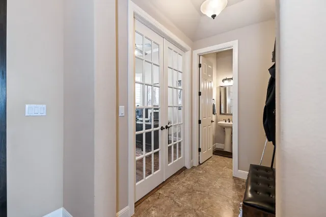 a view of a hallway with a white walls