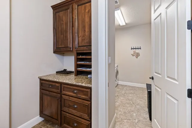 a view of storage and utility room