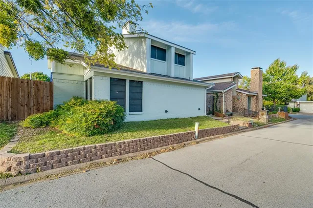 a house view with a backyard space