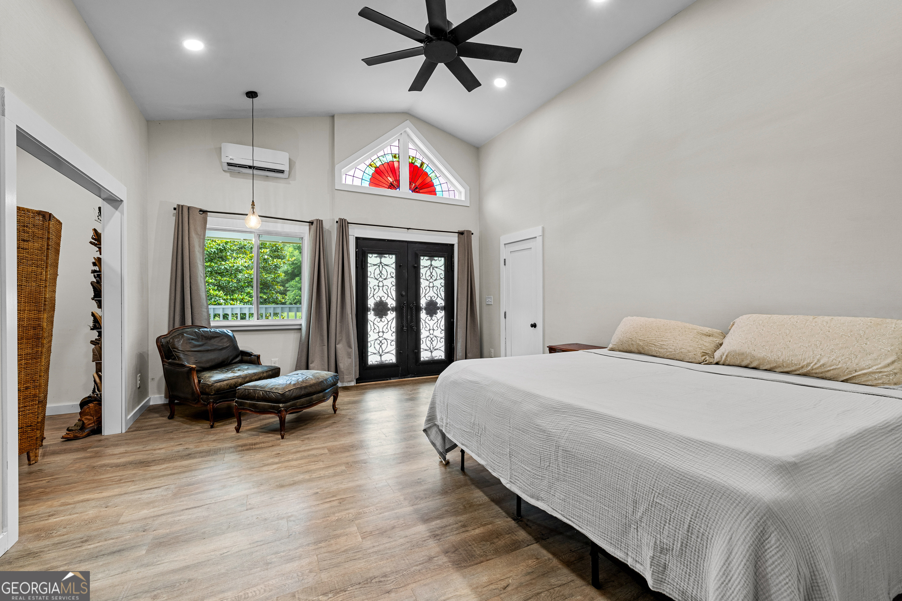 1329 Standing Rock Road Senoia, GA 30276 - Photo 22 of 77 a bedroom with a bed and furniture