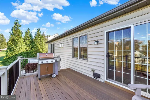 a view of balcony with wooden floor