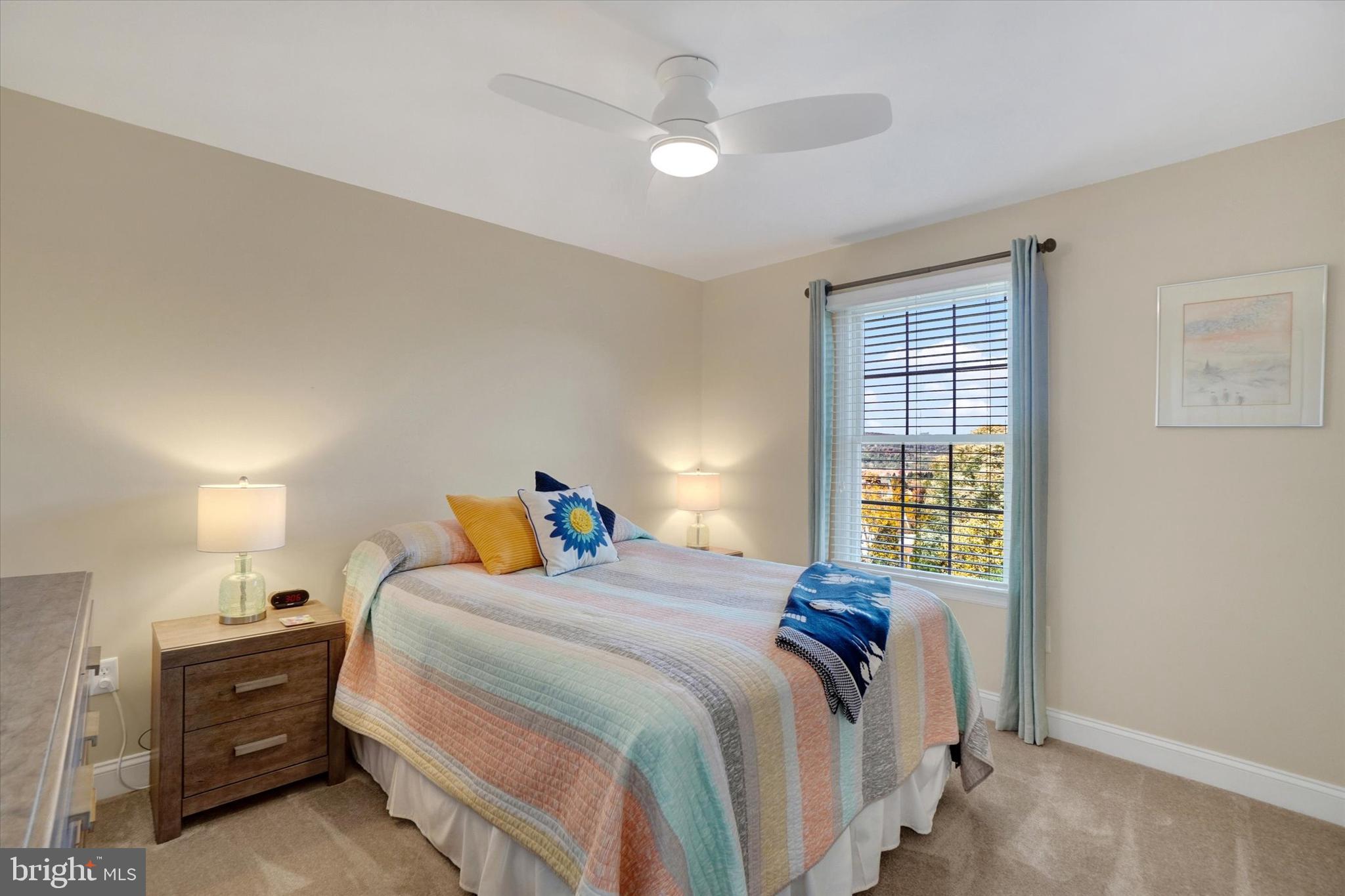 657 Campbell Road York, PA 17402 - Photo 17 of 30 a bedroom with a bed and a window