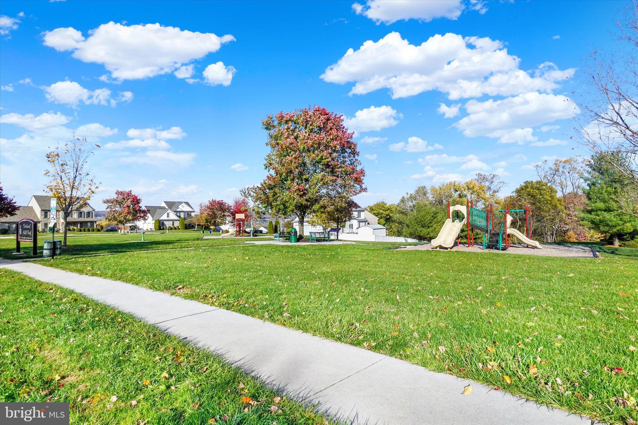 657 Campbell Road York, PA 17402 - Photo 27 of 30 a view of a golf course with a lake
