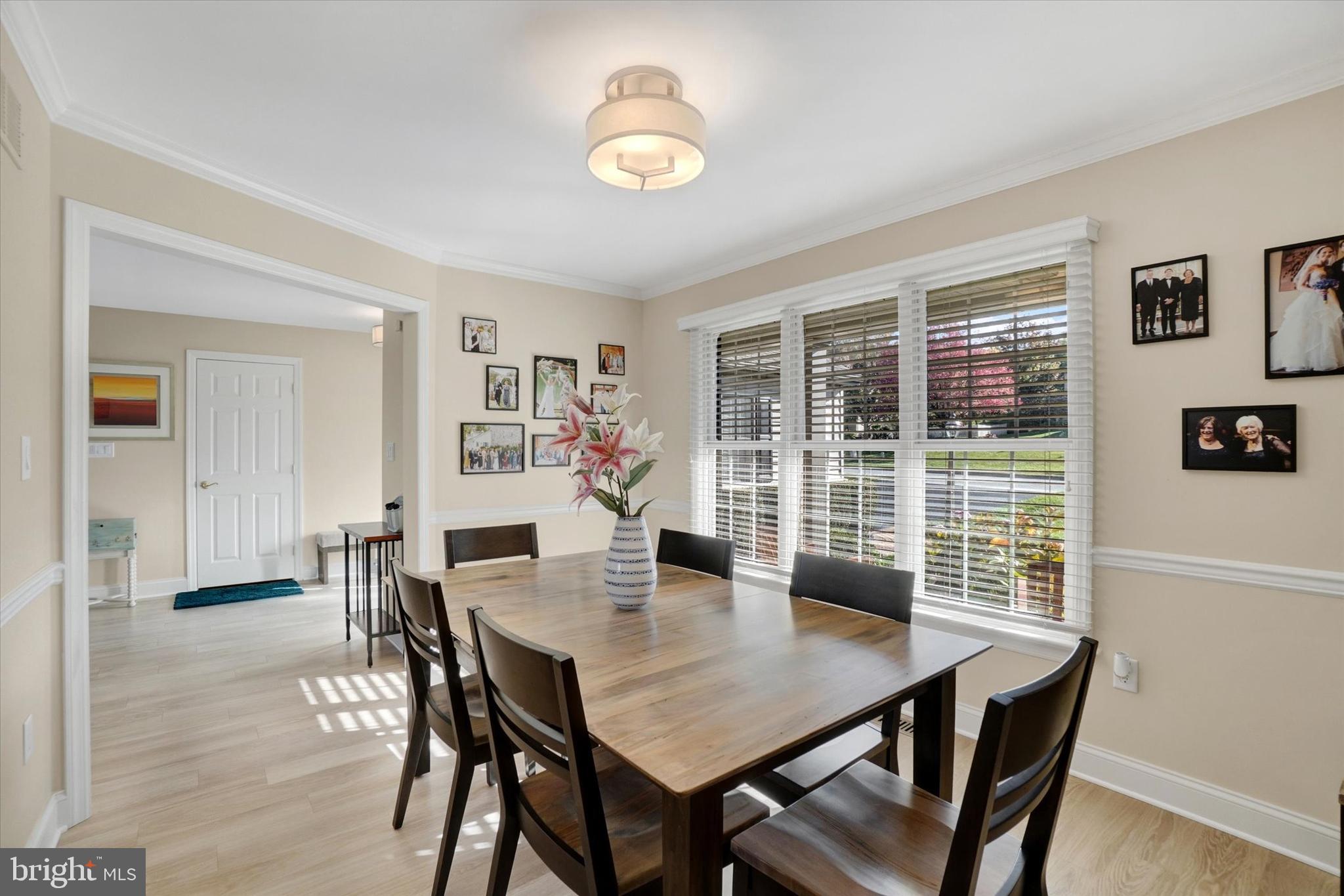 657 Campbell Road York, PA 17402 - Photo 8 of 30 a view of a dining room with furniture and wooden floor