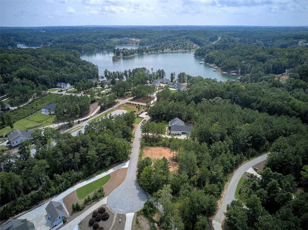 Lot 24 Reservoir Road West Union, SC 29696 - Photo 14 of 46 Overlooking serene lake waters, this wooded community offers prime homesites and unparalleled natural beauty.