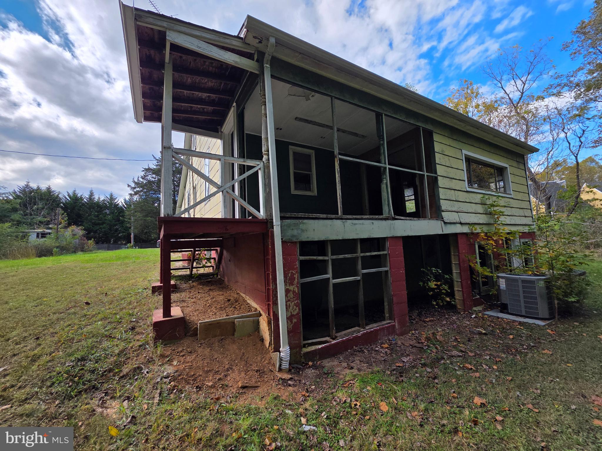 24984 Forrest Cove Way Hollywood, MD 20636 - Photo 9 of 10 a view of a house with a yard and sitting area