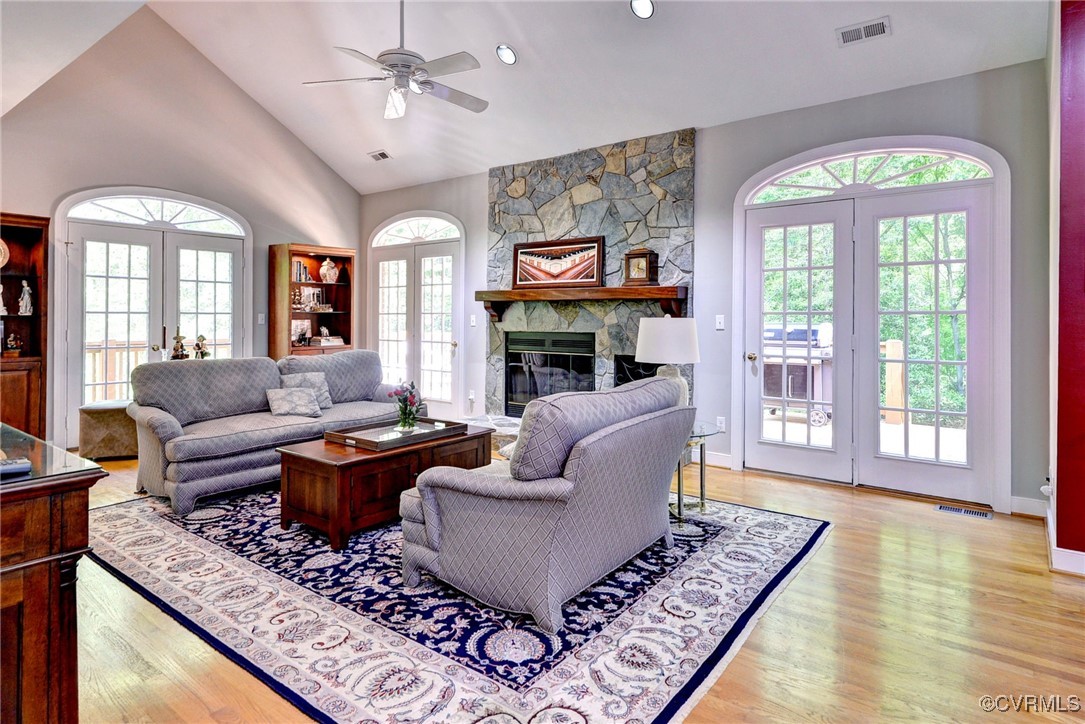 7 Hague Close Williamsburg, VA 23185 - Photo 12 of 50 a living room with fireplace furniture and a large window
