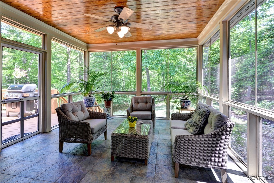 7 Hague Close Williamsburg, VA 23185 - Photo 17 of 50 a living room with furniture and a floor to ceiling window