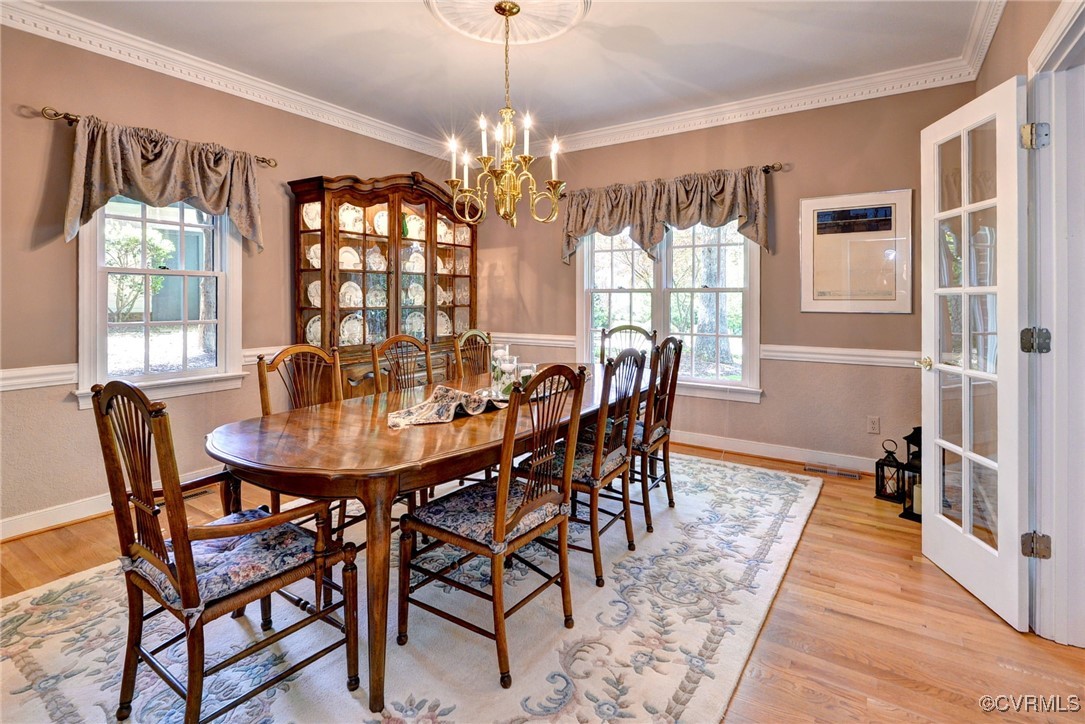 7 Hague Close Williamsburg, VA 23185 - Photo 25 of 50 a view of a dining room with furniture wooden floor and chandelier