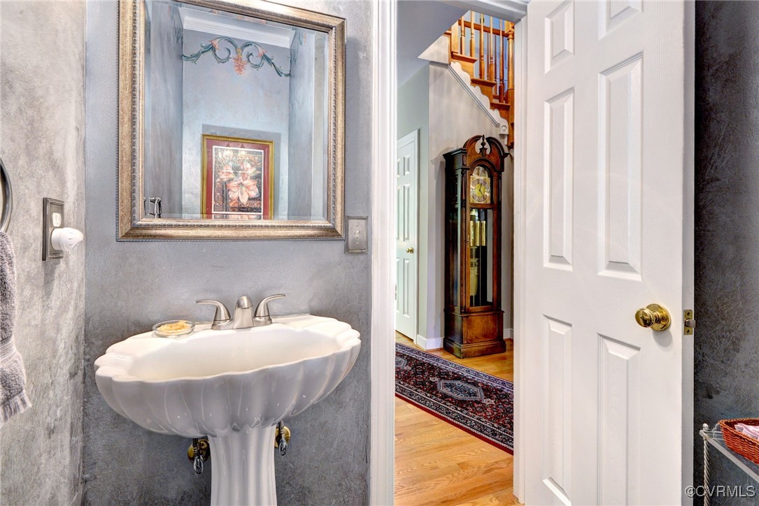 7 Hague Close Williamsburg, VA 23185 - Photo 27 of 50 a bathroom with a sink a mirror and shower