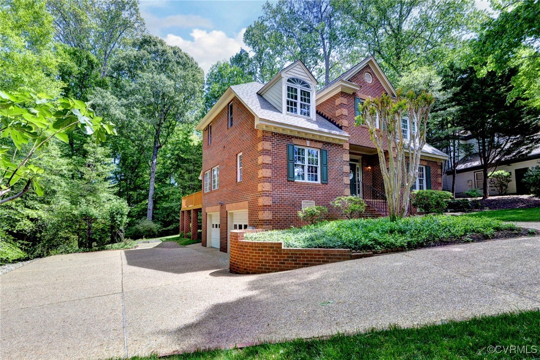 7 Hague Close Williamsburg, VA 23185 - Photo 3 of 50 a front view of a house with a yard and garage