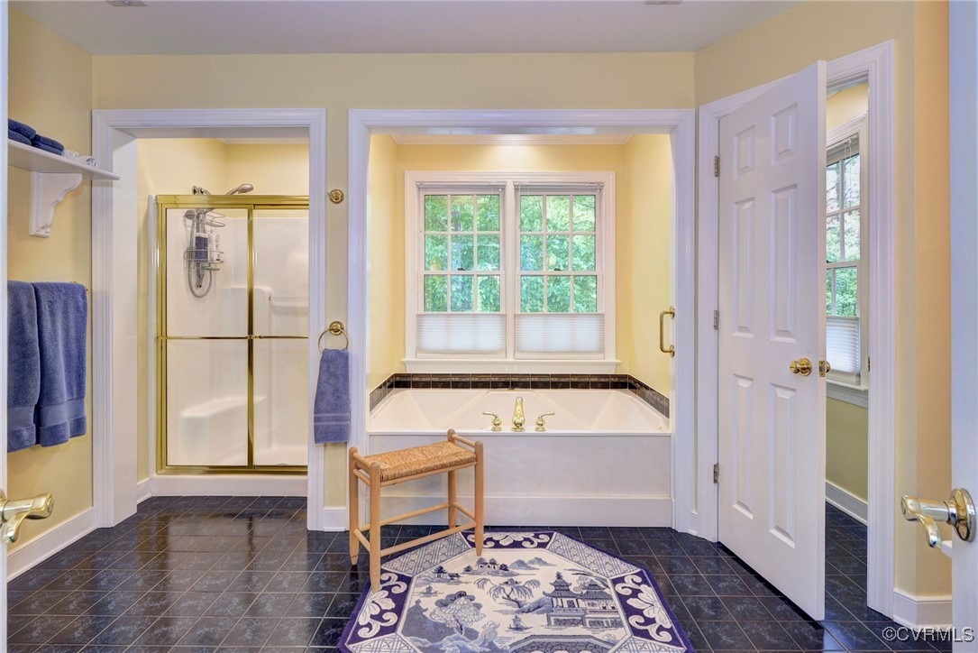 7 Hague Close Williamsburg, VA 23185 - Photo 32 of 50 a bathroom with a bathtub and a shower