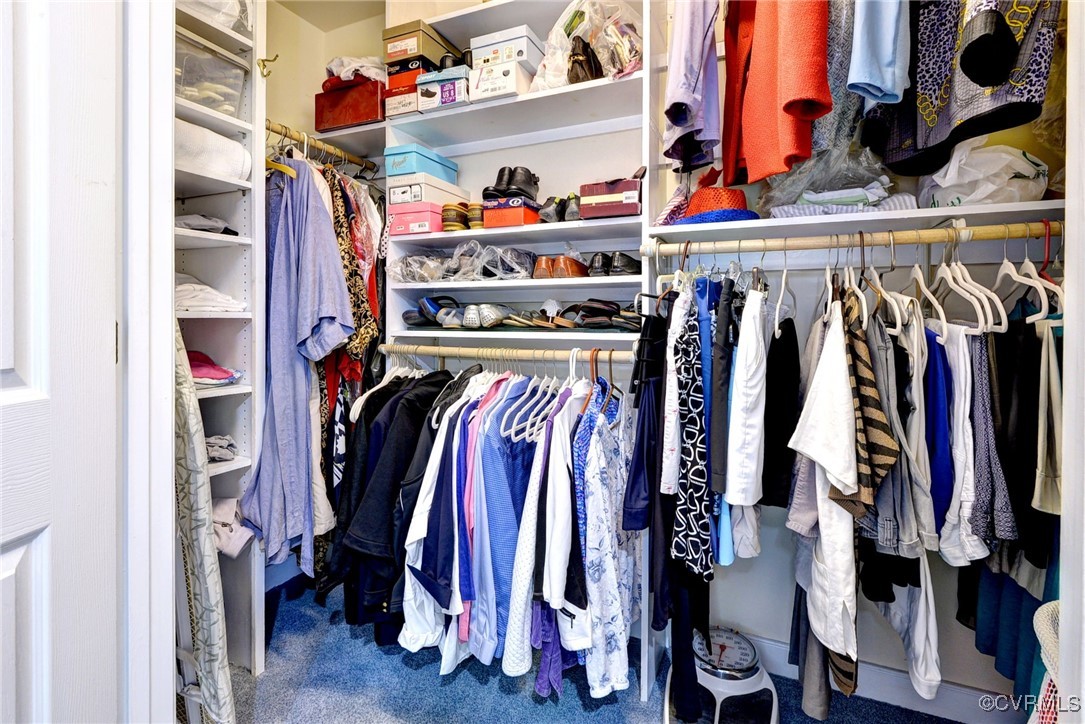 7 Hague Close Williamsburg, VA 23185 - Photo 34 of 50 a view of walk in closet with clothes and shoes