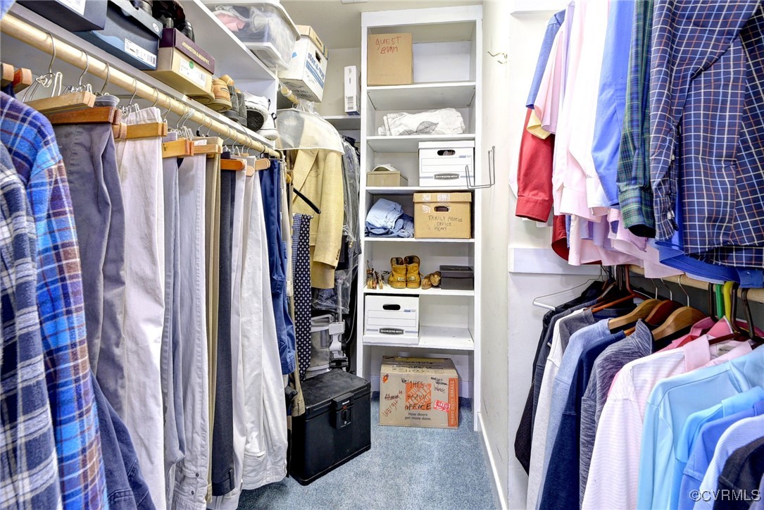 7 Hague Close Williamsburg, VA 23185 - Photo 35 of 50 a view of walk in closet with clothes and shoes
