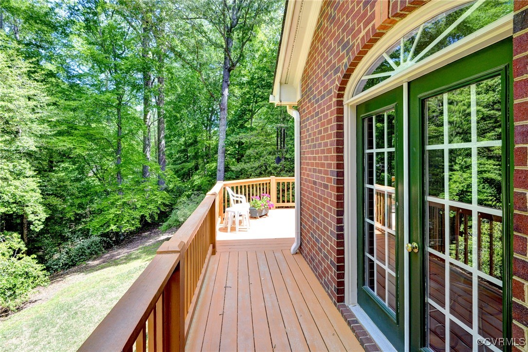 7 Hague Close Williamsburg, VA 23185 - Photo 44 of 50 a view of balcony with balcony and wooden floor