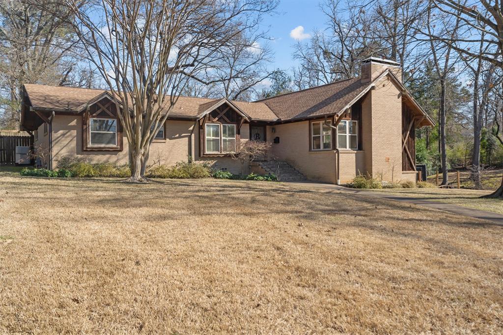 2526 Pounds Avenue Tyler, TX 75701 - Photo 1 of 25 a front view of a house with a yard