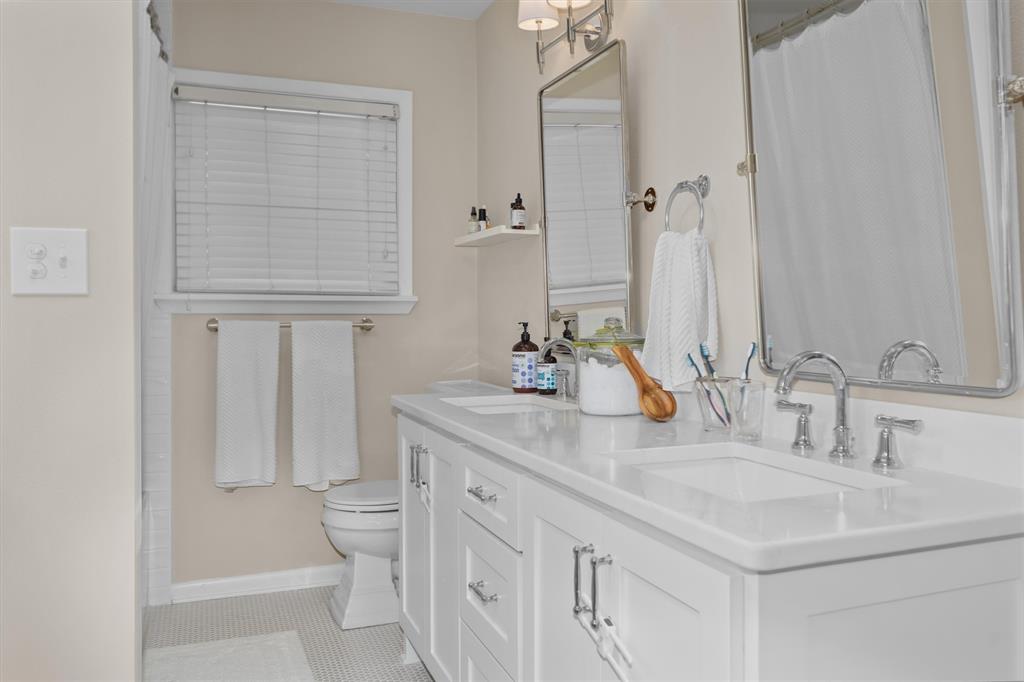 2526 Pounds Avenue Tyler, TX 75701 - Photo 14 of 25 a bathroom with a sink and a toilet