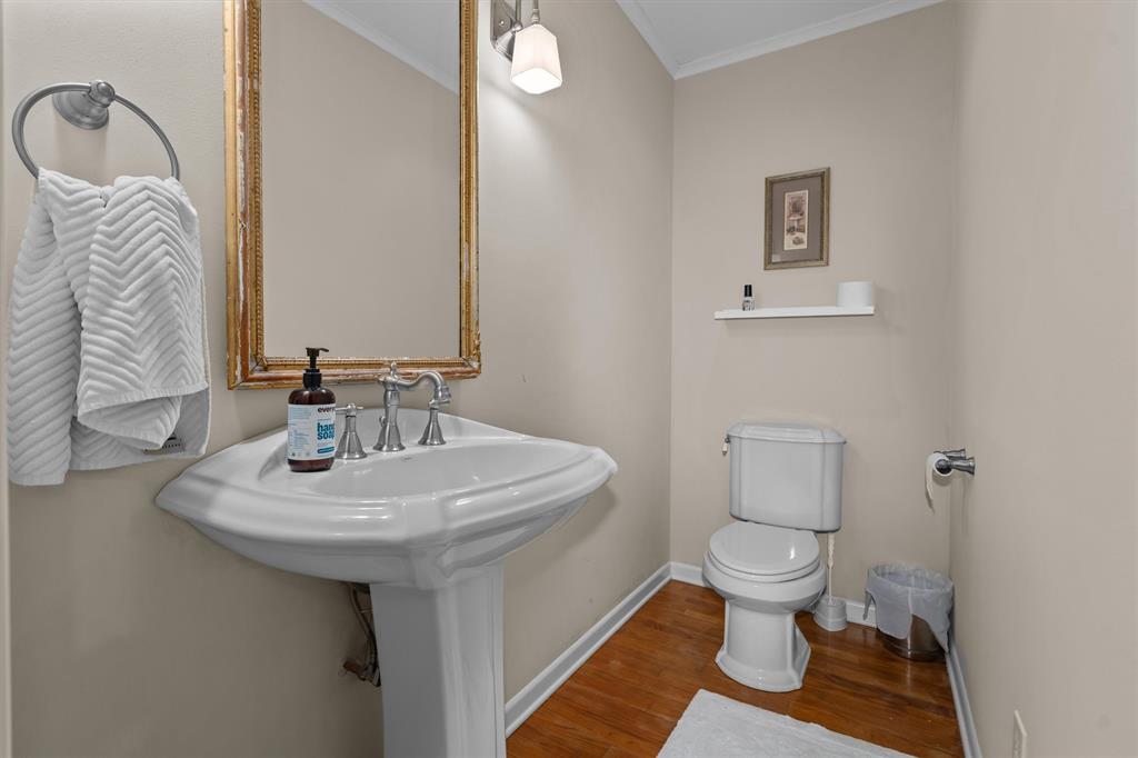 2526 Pounds Avenue Tyler, TX 75701 - Photo 18 of 25 a bathroom with a sink toilet and a mirror