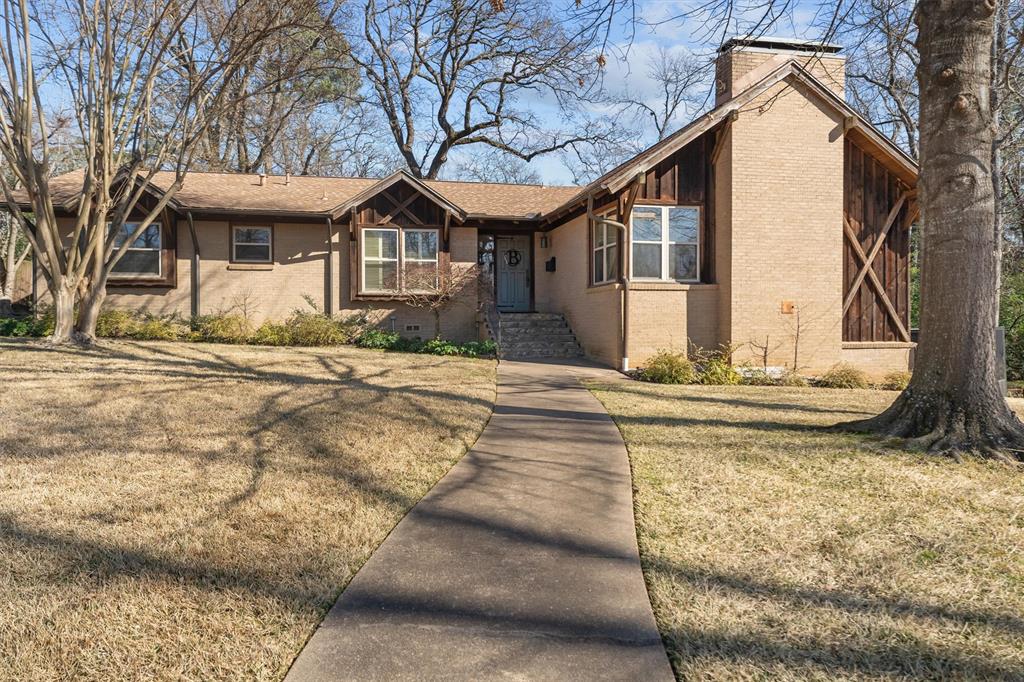 2526 Pounds Avenue Tyler, TX 75701 - Photo 2 of 25 a front view of a house with a yard
