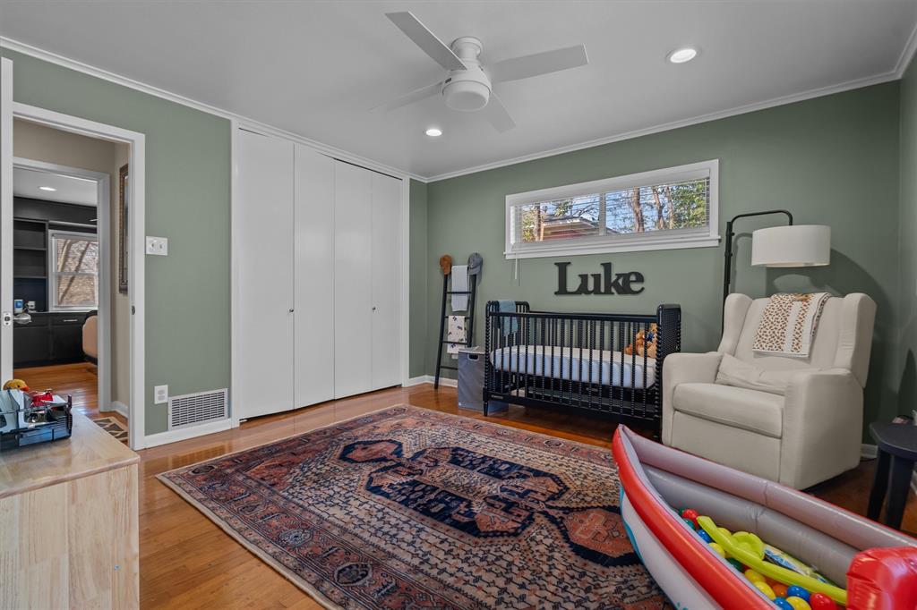 2526 Pounds Avenue Tyler, TX 75701 - Photo 21 of 25 a bedroom with furniture and a rug