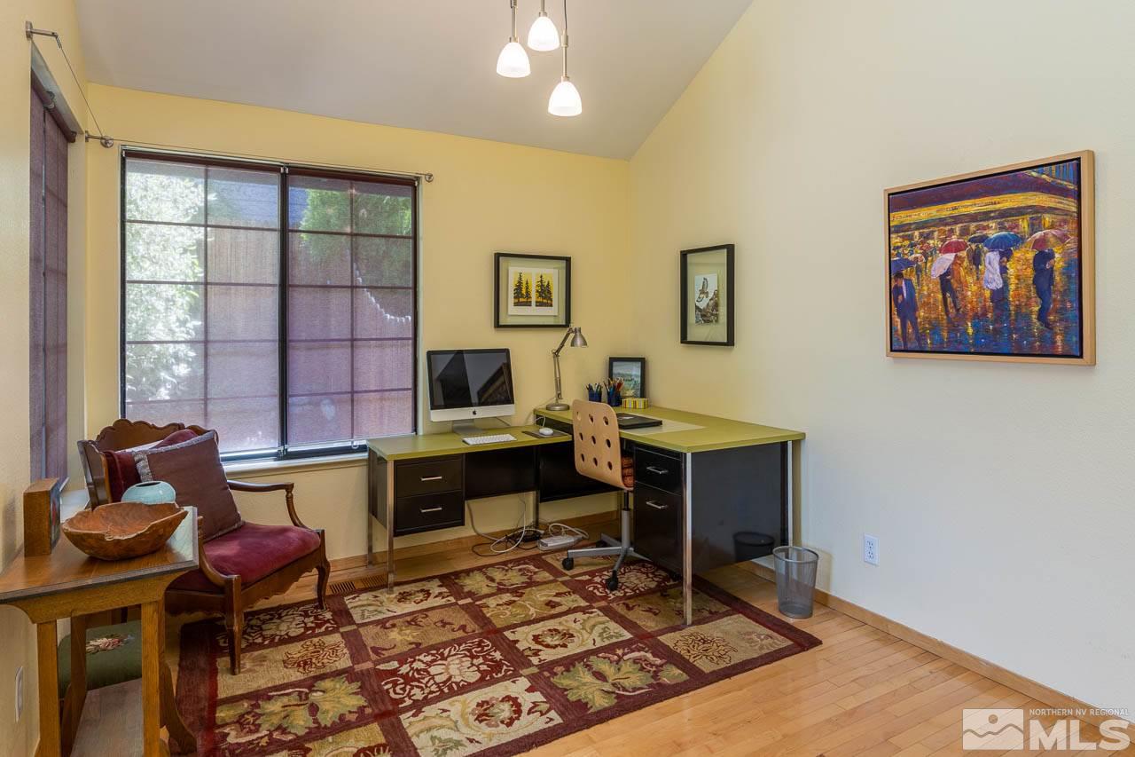 5346 Mountcrest Lane Reno, NV 89523 - Photo 6 of 32 a living room with furniture a rug and a window
