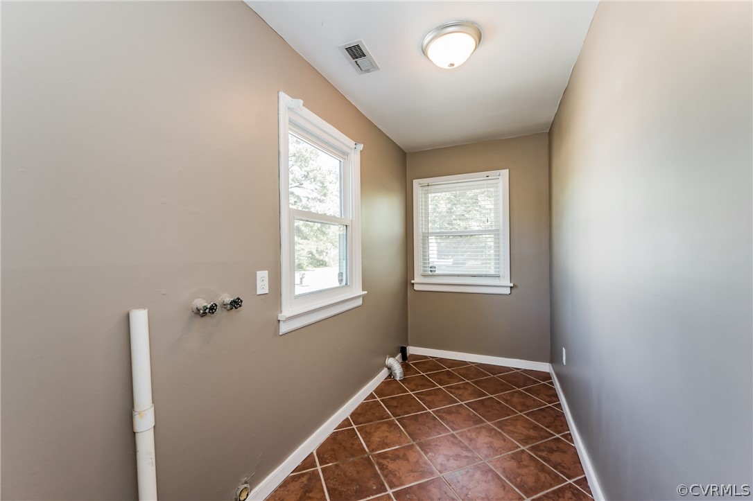 4905 Gilmour Road Sandston, VA 23150 - Photo 28 of 50 Laundry room with tile flr