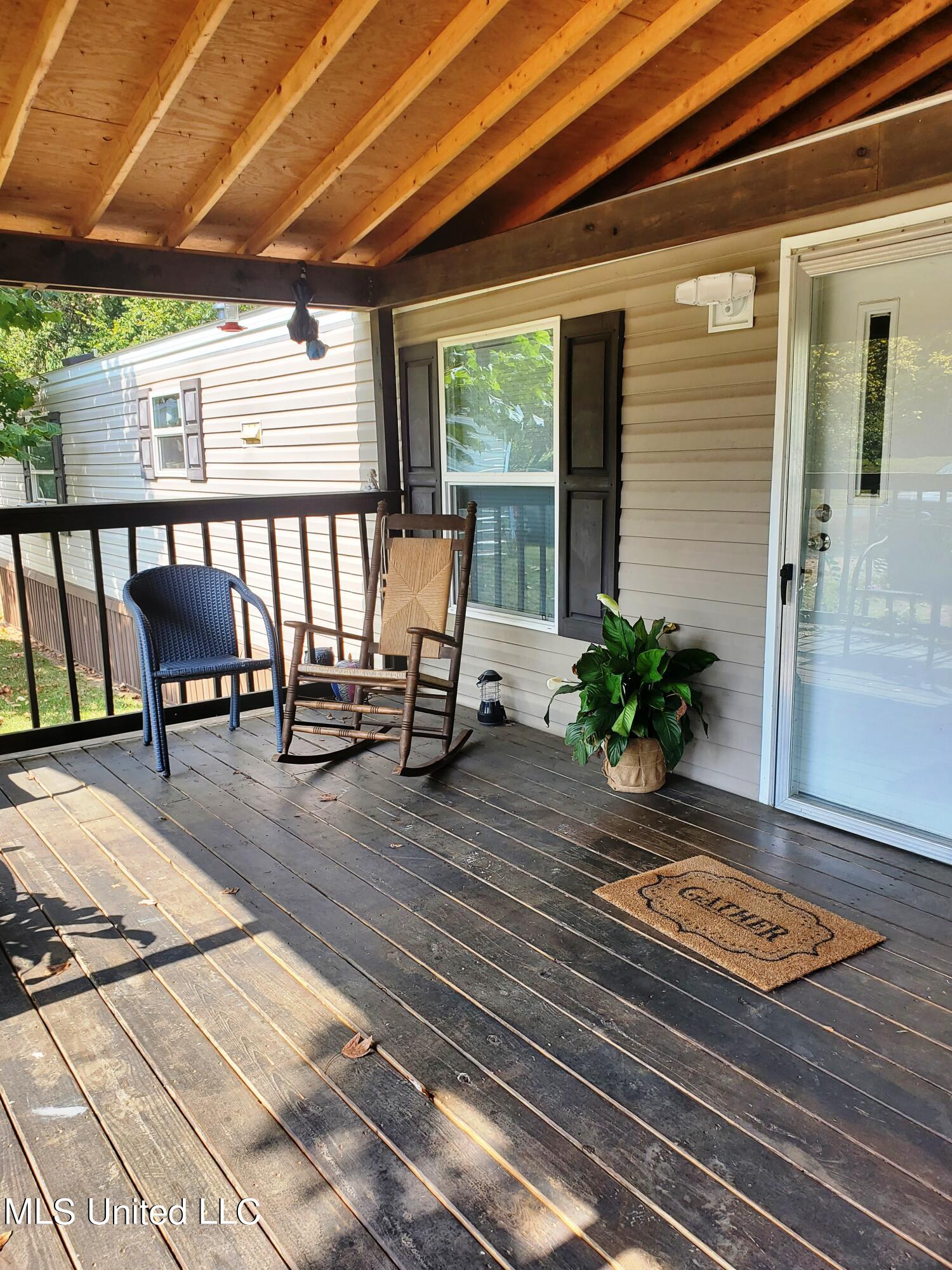 10239 Teasdale Road Enid, MS 38927 - Photo 3 of 21 10239 Teasdale Front porch welcome