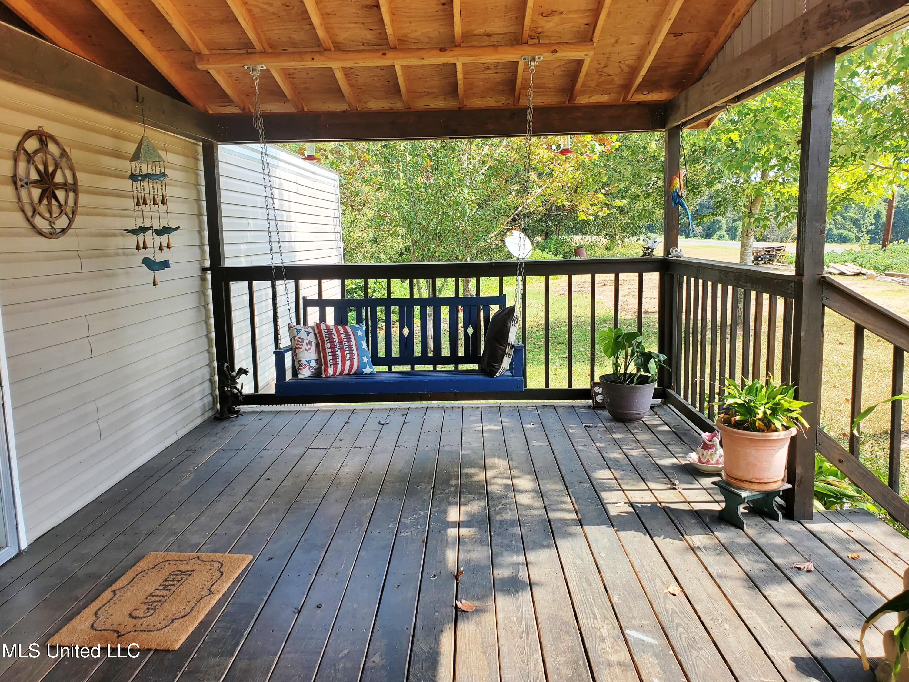 10239 Teasdale Road Enid, MS 38927 - Photo 4 of 21 10239 Teasdale front porch swing
