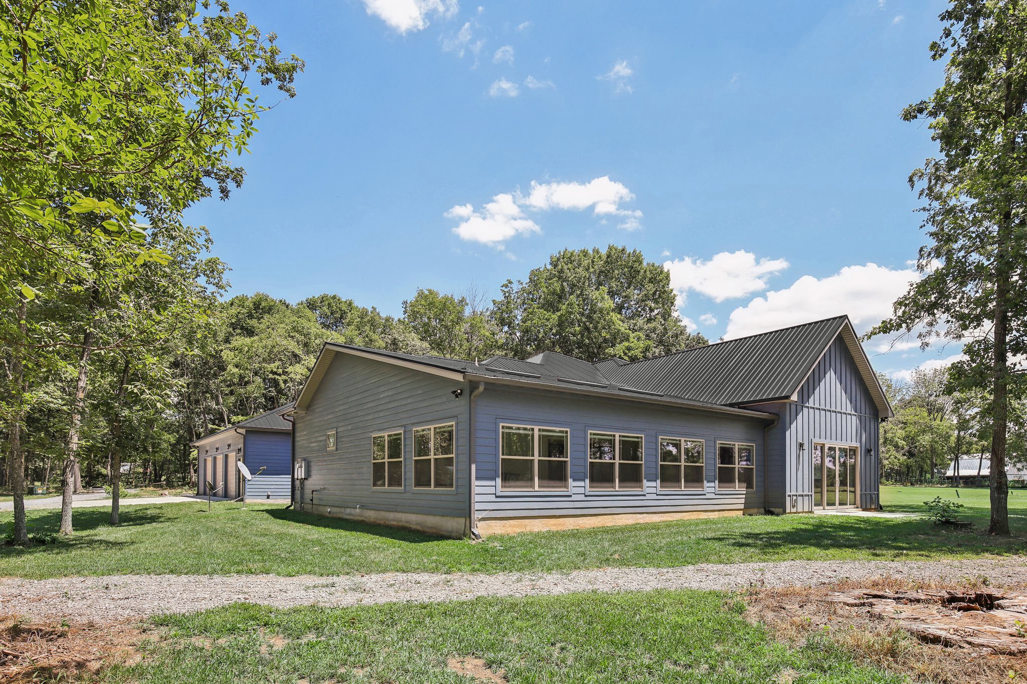 5096 Lytle Creek Road Murfreesboro, TN 37127 - Photo 51 of 70 ***This photo has been modified to show how the home will look if the roof is painted***