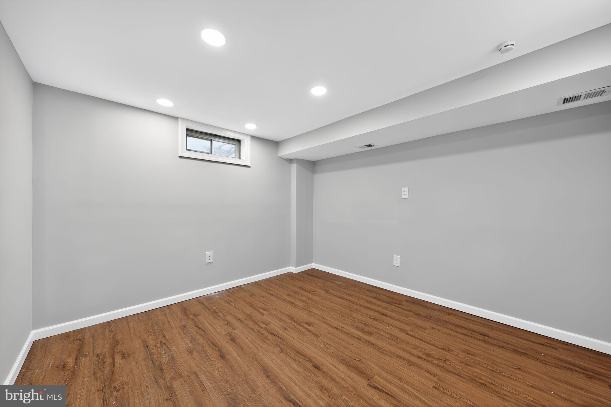 500 New York Road Browns Mills, NJ 08015 - Photo 15 of 21 a view of empty room with wooden floor