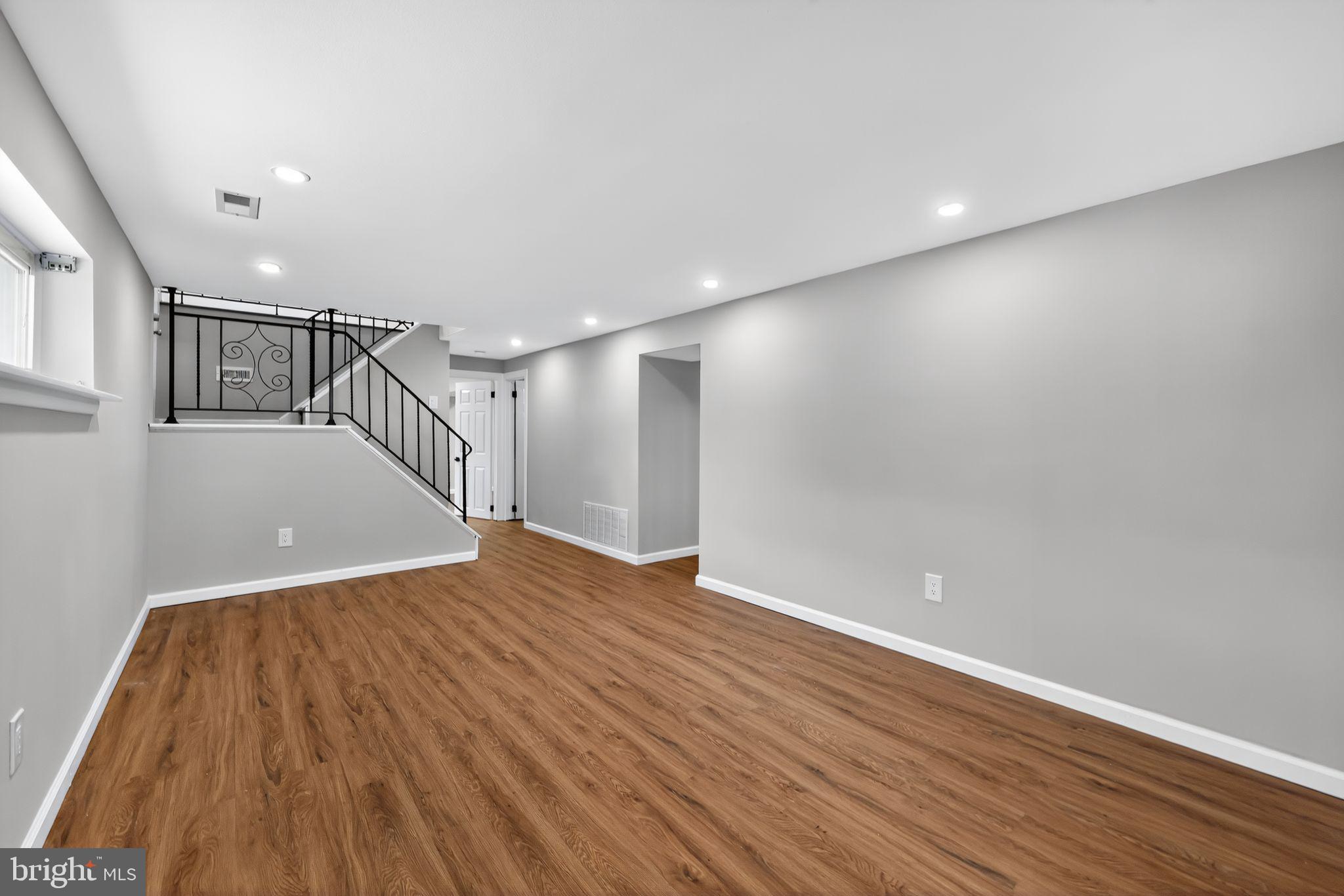 500 New York Road Browns Mills, NJ 08015 - Photo 16 of 21 a view of an empty room with wooden floor