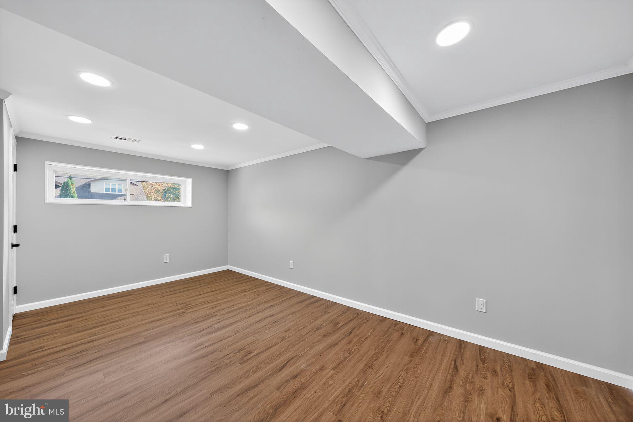 500 New York Road Browns Mills, NJ 08015 - Photo 19 of 21 a view of an empty room with wooden floor