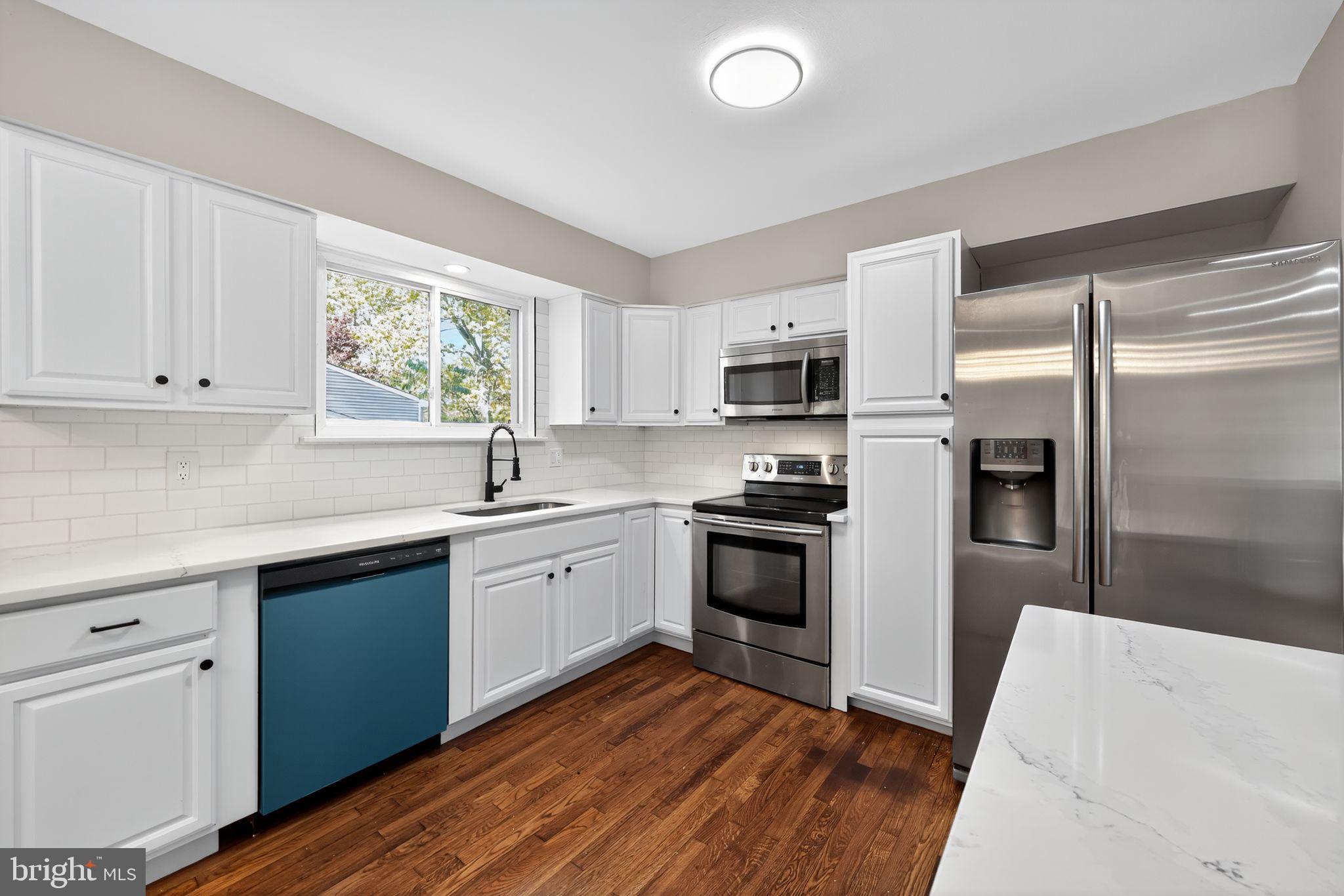 500 New York Road Browns Mills, NJ 08015 - Photo 8 of 21 a kitchen with granite countertop a refrigerator stove and sink