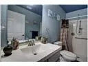 a bathroom with a shower and a shower curtain