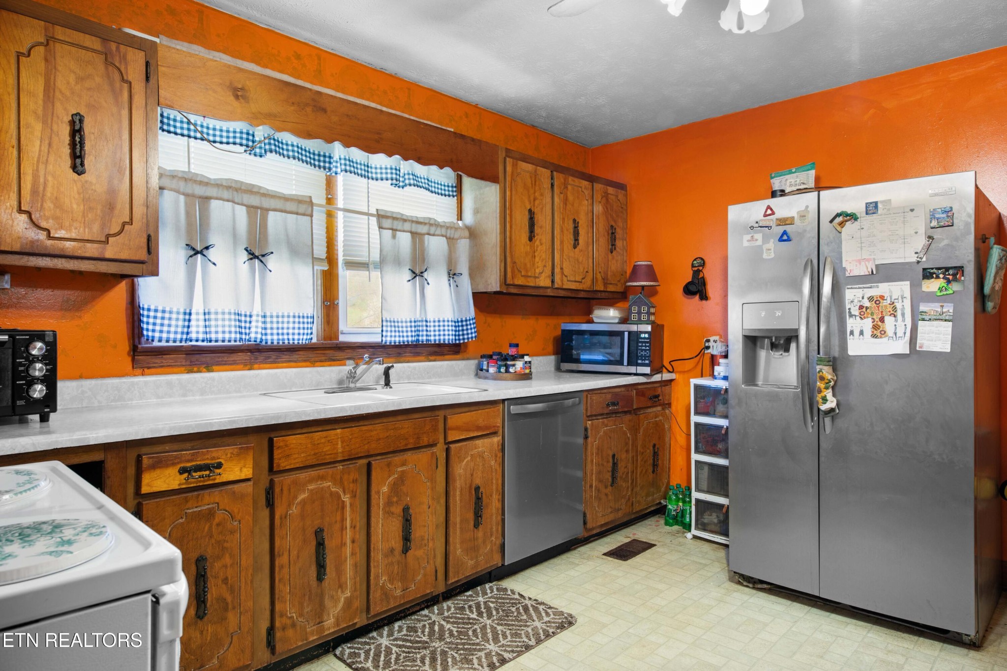 385 Hubbs Grove Road Maynardville, TN 37807 - Photo 10 of 33 a kitchen with stainless steel appliances granite countertop a refrigerator and a stove top oven